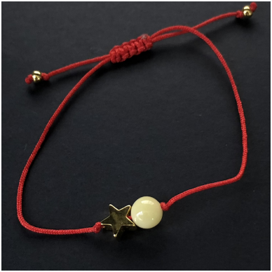 Red string with amber bead "Star"